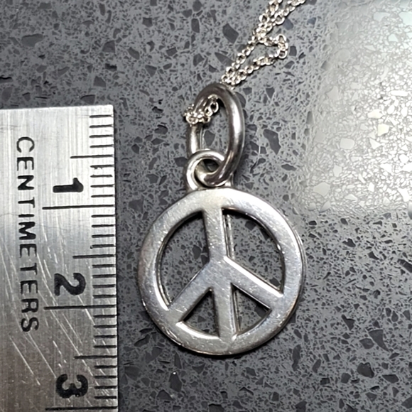 Authentic Tiffany & Co Peace pendant in Sterling silver - Picture 13 of 16